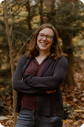 Woman standing with arms folded